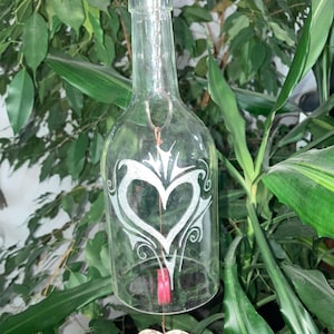 Hand-engraved wine bottle wind chime