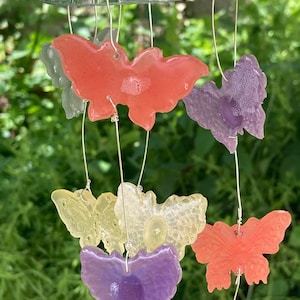 Hand engraved wine bottle wind chime for outdoors with leaf motif and butterflies