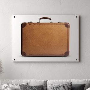 May include: A vintage brown leather suitcase with a top handle and corner reinforcements. The rectangular suitcase has a stitched border and metal clasps. The corners are reinforced with darker brown leather.