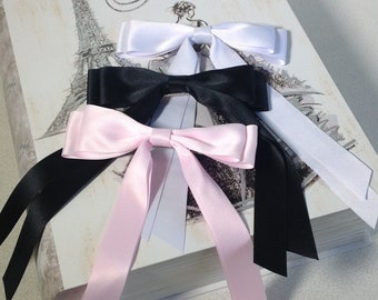 Set of 3 long bowknot hair ribbons in Black, White and Baby Pink.  Trendy hair bow with French barrette clasp on back.  Classic style.