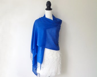 Elegant sapphire / cobalt blue pashmina / scarf.  Lightweight with tassels, suitable for all occasions.  Vibrant colour and soft on skin.