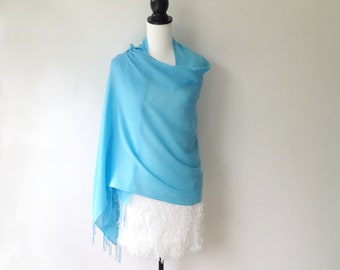 Elegant sky blue pashmina / scarf.  Lightweight with tassels, suitable for all occasions.  Vibrant colour and soft on skin.