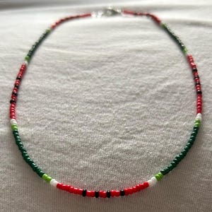 Colar de melancia com miçangas - renda doada à PCRF