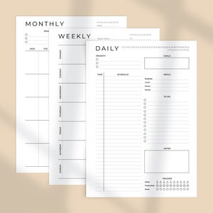 May include: A printable planner with three sections: monthly, weekly, and daily. The planner has a simple design with black text on a white background. The monthly section has a grid for each day of the month. The weekly section has a grid for each day of the week. The daily section has space for a priority list, schedule, meals, to-do list, notes, and a tracker.
