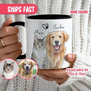 May include: White ceramic mug with a black interior and handle, featuring watercolor illustrations of a cat and a dog, with the names "Max" and "Lucha". The mug also includes two smaller pet portraits and the text "More Colors".