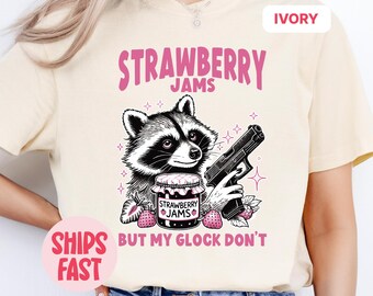 Comfort Colors® Funny Raccoon Shirt, Strawberry Jams But My Glock Don’t, Trendy Meme T-Shirt, Funny Raccoon Graphic Tee