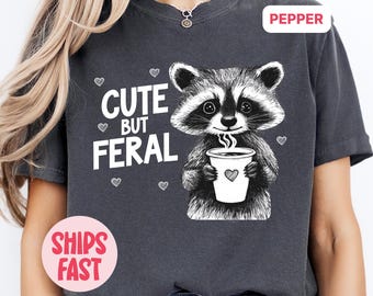 Cute But Feral Shirt, Meme Funny Raccoon Shirt, Oversized Graphic T Shirt, Women’s shirts, Gift for Her, Fall Coffee Shirt, Raccoon Meme Tee