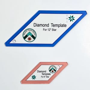 May include: Two diamond-shaped quilting templates with white centers and colored borders. The larger blue template is labeled Diamond Template For 12" Star. The smaller pink template is labeled Diamond Template For 6" Star. Both feature the Shadow Valley Quilts logo.