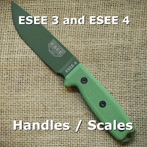 May include: Green ESEE 3 and ESEE 4 knife handles with a textured surface and black screws. The knife blades are not visible in the image.  Handles / Scales.