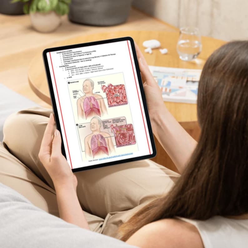 K&ouml;nnte beinhalten: Ein schwarzes Tablet mit medizinischen Diagrammen der Lunge und zugeh&ouml;rigem Text. Das Tablet wird von einer Person gehalten, wobei der Fokus auf dem Bildschirm liegt. Die Diagramme zeigen Lunge und Alveolen mit Beschriftungen und Anmerkungen. Der Hintergrund ist unscharf.
