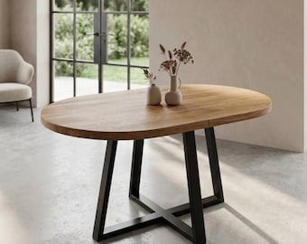 Tavolo da pranzo ovale pieghevole: piano in legno massello e base in metallo nero. Idea regalo.