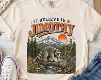 I Believe in Jimothy T-shirt | Raccoon Mountain Sunset Graphic, Funny Jimothy Tshirt, Comfort Colors tshirt, Jimothy raccoon