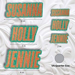 May include: Glittery orange and green name tags with the names Susanna, Holly, and Jennie. The Susanna tag is 4 inches long, Holly is 3 inches, and Jennie is 4 inches. A smaller Susanna tag is 2 inches, and a Jennie tag is 2 inches. A US quarter is shown for size comparison.