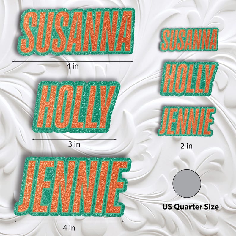 May include: Glittery orange and green name tags with the names Susanna, Holly, and Jennie. The Susanna tag is 4 inches long, Holly is 3 inches, and Jennie is 4 inches. A smaller Susanna tag is 2 inches, and a Jennie tag is 2 inches. A US quarter is shown for size comparison.