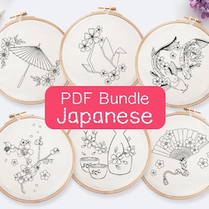 以下が含まれることがあります： 日本のデザインにインスパイアされた6つの刺繍パターンのセット。パターンには、桜の枝、扇子、日本酒のボトル、鯉、折り鶴、傘が含まれています。
