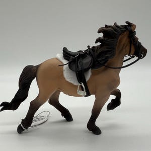 English saddle set for CollectA or Schleich.  horse not included.