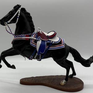 Hand crafted leather Western saddle and bridle. Saddle blanket included.  Fits traditional Breyer or Peter Stone. HORSE NOT INCLUDED #28