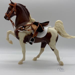 Leather English model horse saddle and bridle. #59