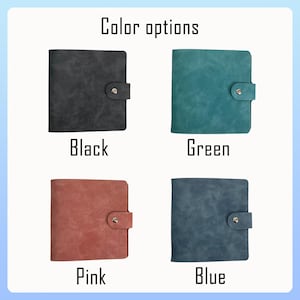 May include: Four square notebooks are displayed, each in a different colour: black, green, pink, and blue. Each notebook features a button closure. The text "Color options" is at the top, with the colour names below each notebook.