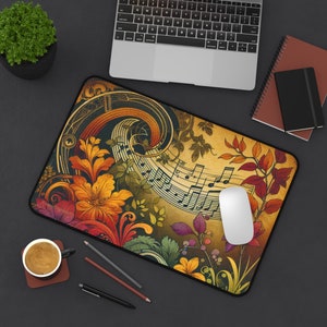 May include: A colorful mousepad with a musical note design. The design features a variety of colors, including red, yellow, green, and blue. The mousepad is made of a soft, durable material and is perfect for use with a computer mouse.