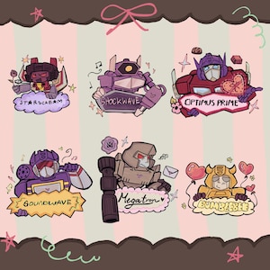 May include: Illustration of six Transformers characters: Starscream, Shockwave, Optimus Prime, Soundwave, Megatron, and Bumblebee. Each character is depicted with a unique design and name tag, surrounded by decorative elements like hearts and stars. The background is a pink and brown striped pattern.