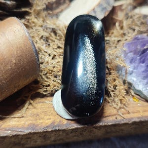 silver obsidian, pierced stone pendant, Mexico.