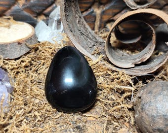 "rainbow" or "celestial eye" obsidian, double-sided cabochon, 3.3 cm, Mexico.