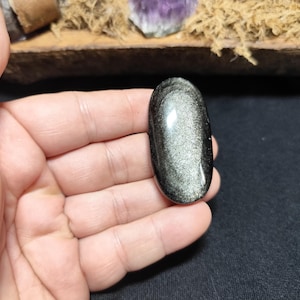 silver obsidian, pierced stone pendant, Mexico.