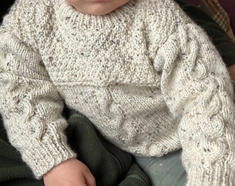 Hand-knitted cable jumper