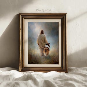 May include: Framed art print featuring a figure in a white robe walking with a dog through a field. The artwork has a soft, ethereal quality with a golden frame. The text "Paw of Love" is visible in the upper left corner.