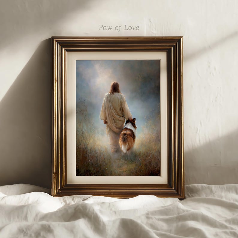 May include: Framed art print featuring a figure in a white robe walking with a dog through a field. The artwork has a soft, ethereal quality with a golden frame. The text "Paw of Love" is visible in the upper left corner.