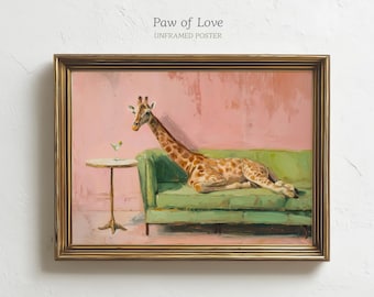 May include: A framed poster titled Paw of Love featuring a painting of a giraffe lying on a green sofa next to a small round table with a cocktail glass. The background is a solid pink wall. The frame is metallic gold with a rectangular shape.