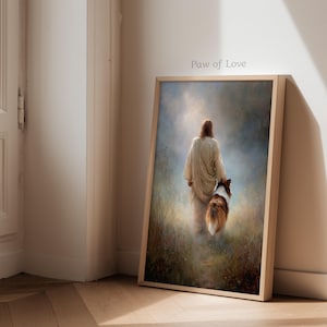 May include: Framed art print featuring a person in a flowing robe walking with a dog. The artwork has a soft, ethereal quality with a light background and the text "Paw of Love". The frame is a light wood color.