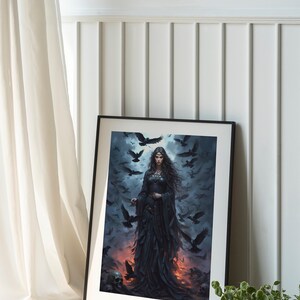 May include: A framed print of a dark-haired woman in a black dress surrounded by crows. The text "MORRIGAN Goddess of War" is at the bottom of the print.