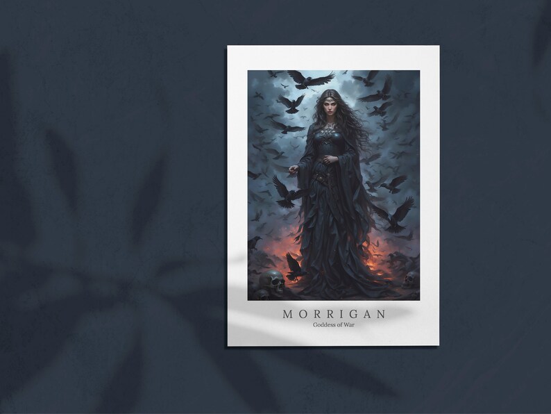 May include: A digital art print of a woman in a black dress standing in a field of crows. The woman has long dark hair and is holding a staff. The text "MORRIGAN Goddess of War" is at the bottom of the print.