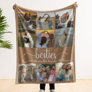 May include: A brown fleece blanket with a collage of photos of friends. The photos are arranged in a grid pattern and feature various poses and settings. The blanket has the text "besties" and "True Friends are the Family We Choose" printed on it.