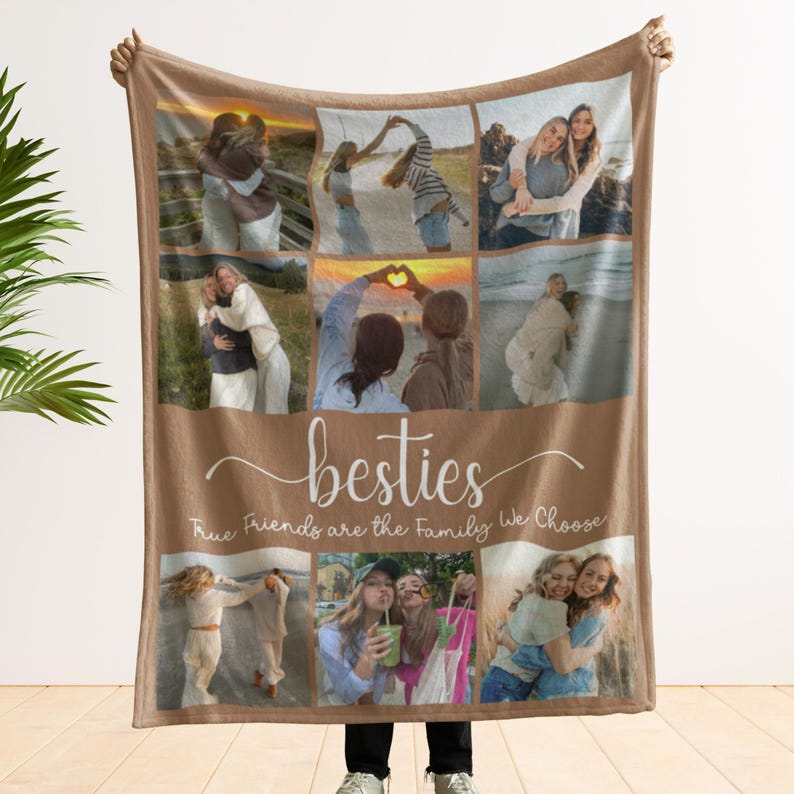 May include: A brown fleece blanket with a collage of photos of friends. The photos are arranged in a grid pattern and feature various poses and settings. The blanket has the text "besties" and "True Friends are the Family We Choose" printed on it.