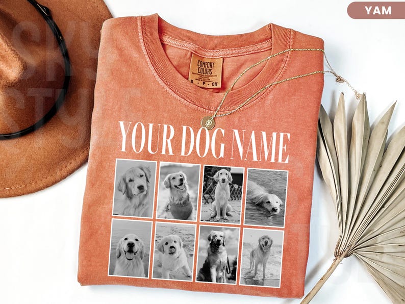 May include: A rust-coloured crew neck t-shirt featuring the text YOUR DOG NAME in white capital letters above a grid of eight black and white photographs of dogs. The shirt has a Comfort Colors brand label at the inner neckline.