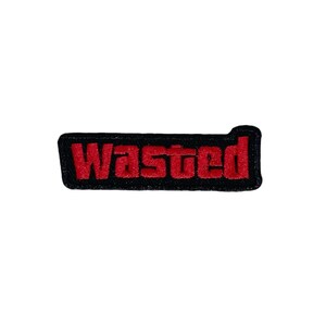 May include: Black and red embroidered patch with the word "Wasted" in red.