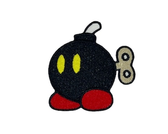 Gestickte Bombe zum Aufbügeln: Dekorative Applikation