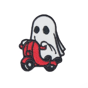 May include: A white ghost riding a red scooter. The ghost has two black eyes and a white sheet. The scooter has black wheels and a black outline.