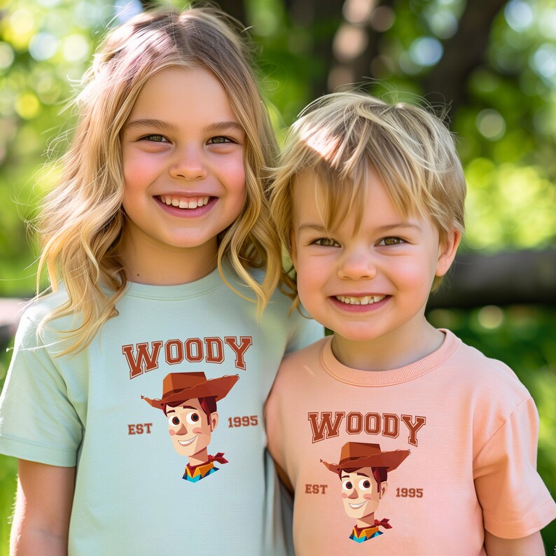 two young children standing next to each other