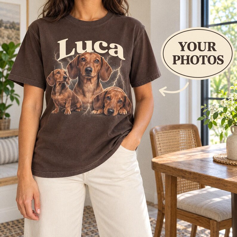 Person in a brown tee with three dachshund portraits and Luca lettering.