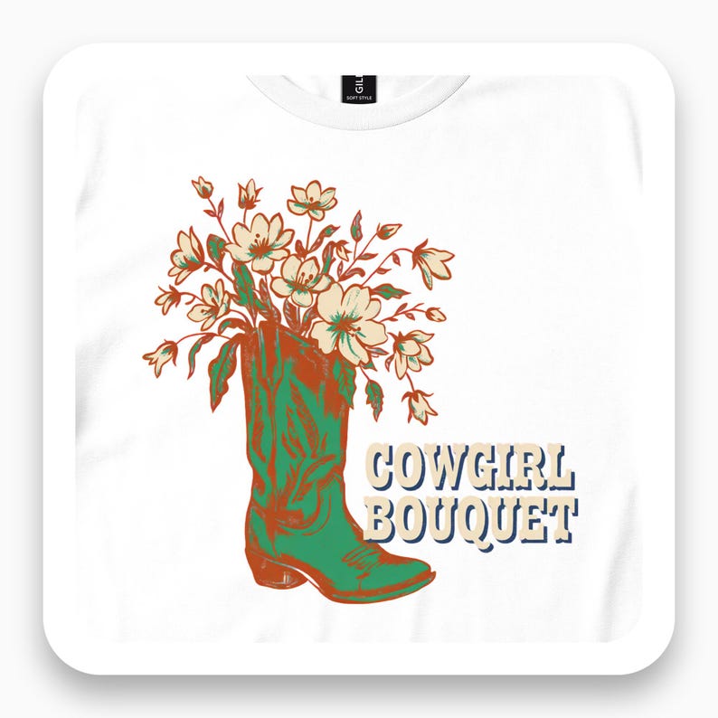 Close-up of white T-shirt with flowers in a green cowboy boot and Cowgirl Bouquet text.