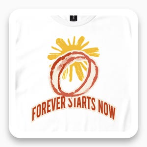 May include: A white t-shirt featuring a graphic print of a stylized orange ring centered in front of a yellow sunburst design. Below the ring, the text "FOREVER STARTS NOW" is printed in a bold, orange, arched font on the front of the garment.