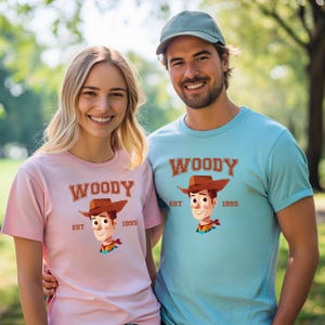 a man and a woman standing next to each other