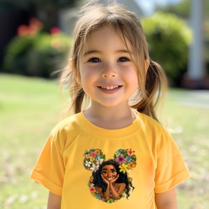 a little girl that is standing in the grass