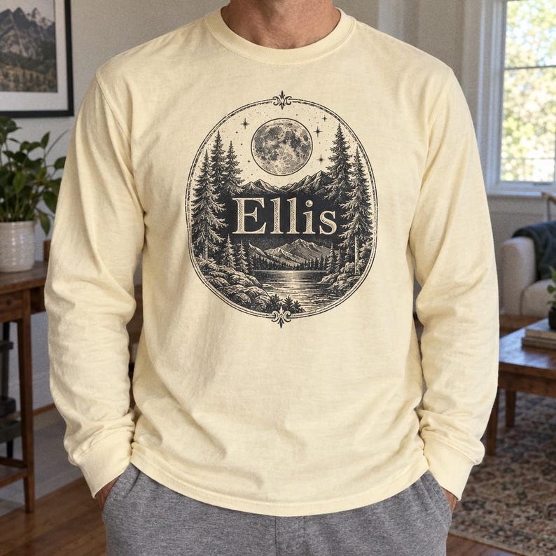 Cream Ellis moonlit forest shirt worn with gray trousers.