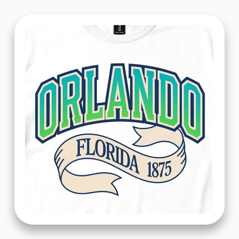 Framed close view of white T-shirt with green Orlando varsity lettering above a Florida 1875 ribbon.
