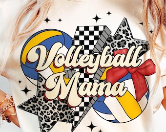 May include: White t-shirt with a graphic design featuring a volleyball, a checkered pattern, a leopard print, and the text "Volleyball Mama" in a retro font.